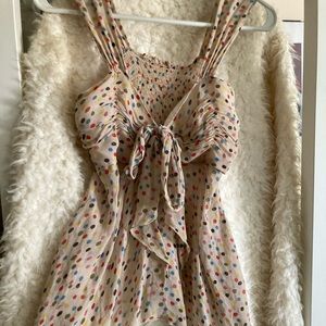 Multi colored sheer women’s top perfect for a party🎉